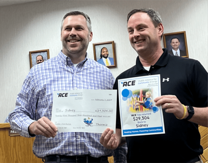 Sidney receives ACE revenue return check