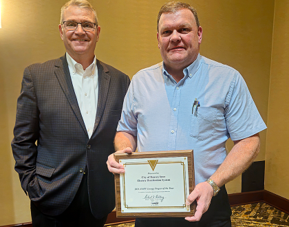 Larry Farley receives award for Denver, Iowa
