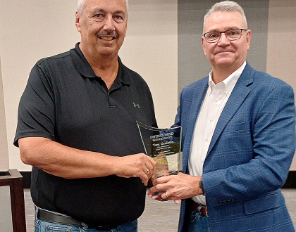 Tom Goulette accepting Distinguished Service Award