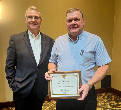 Larry Farley receives award for Denver, Iowa