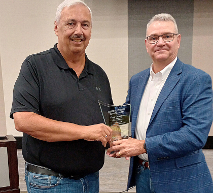 Tom Goulette accepting Distinguished Service Award